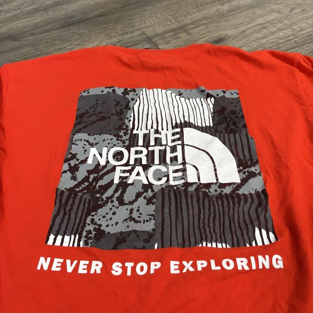 The North Face Shirt Mens Medium Orange Long Sleeve Graphic Circular Design